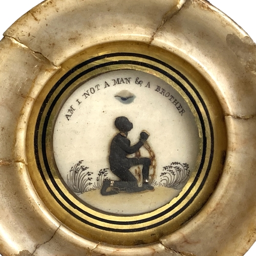 518 - An early 19th century Anti-slavery plaque.
Relief decorated & painted on bone. Mounted in Alabaster ... 