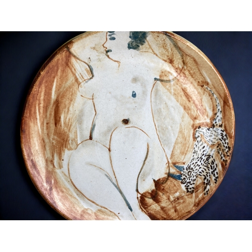 609 - Elizabeth Cummings, painted stoneware plate.
Depicting image of nude.
Signed to nude. 
Diameter - 25... 