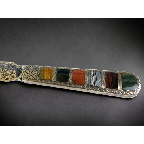 510 - A Victorian sterling silver paper knife. 
Brookes & Crookes, Sheffield. Hallmarks date to 1861.
The ... 