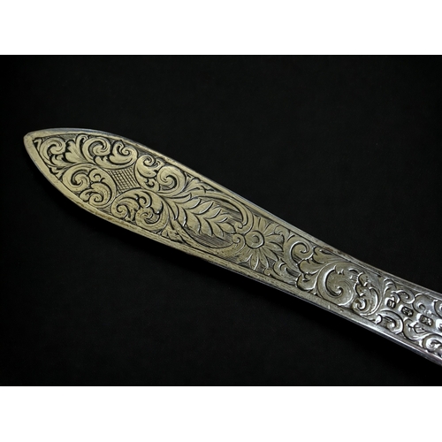 510 - A Victorian sterling silver paper knife. 
Brookes & Crookes, Sheffield. Hallmarks date to 1861.
The ... 