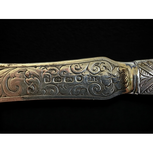 510 - A Victorian sterling silver paper knife. 
Brookes & Crookes, Sheffield. Hallmarks date to 1861.
The ... 