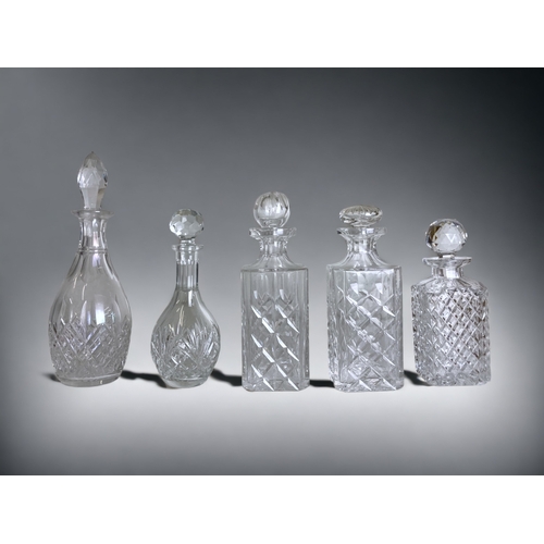 488 - A COLLECTION OF FIVE 19TH CENTURY & LATER CUT GLASS DECANTERS.