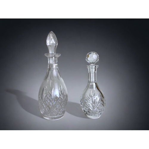 488 - A COLLECTION OF FIVE 19TH CENTURY & LATER CUT GLASS DECANTERS.