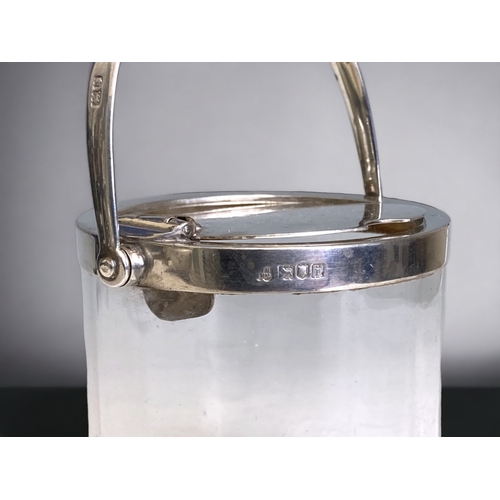 511 - Unusual sterling Silver topped lift-lid preserve jar & spoon.
By Hukin & Heath.
With Patented lift-l... 