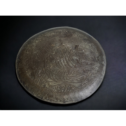 619 - An Arts & Crafts hand worked copper charger. In the manner of John Pearson.
Circa 1890.
Diameter - 4... 