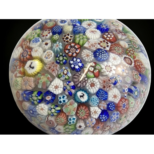 664 - A scarce Baccarat close packed Millefiori Paperweight. 
'B' mark & 1848 worked into a cane.