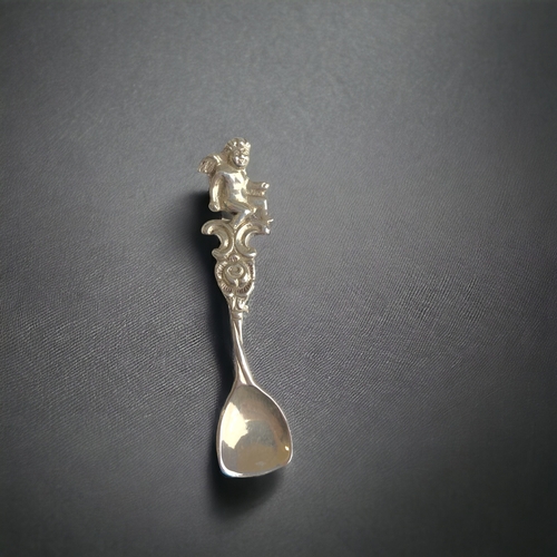 595 - Two sterling Silver & cut glass Swan salts. Together with a silver salt spoon.