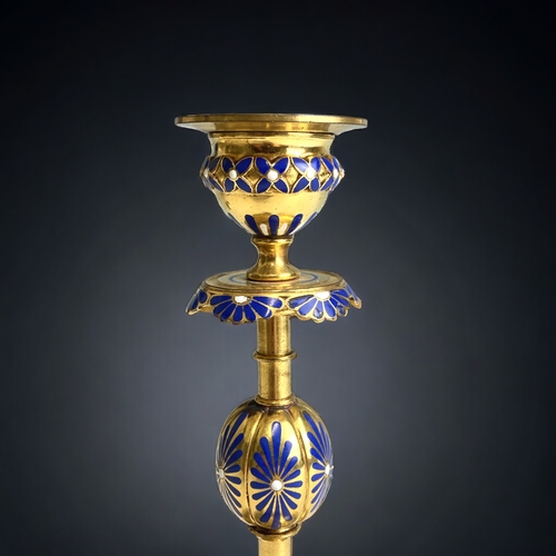 596 - A pair of rare Victorian Elkington Gilt & enamel candlesticks. 
Marked to base.