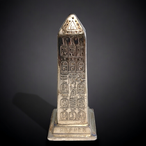 706 - A Victorian silver plate 'Egyptian' obelisk pepper shaker. registration lozenge & makers marks to ba... 