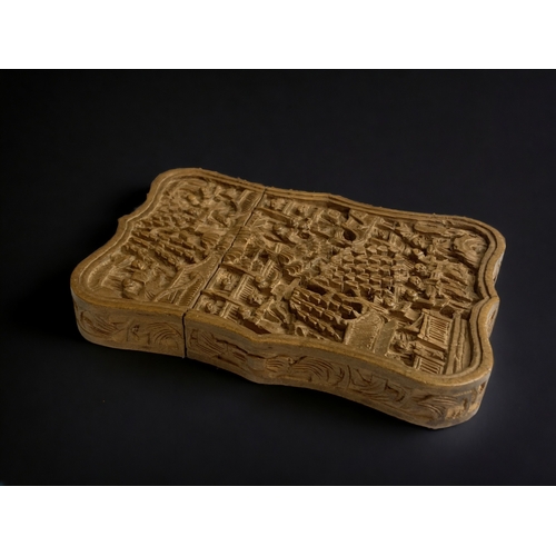 63 - A Chinese finely carved sandal wood card case.