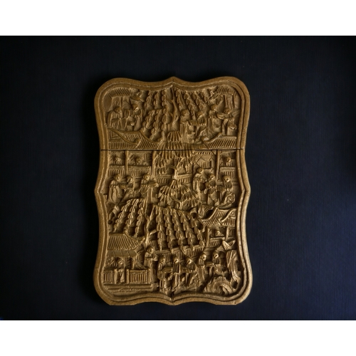 63 - A Chinese finely carved sandal wood card case.