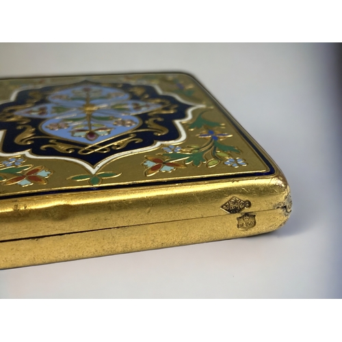 667 - A Victorian Gilt & Enamel card case. 
Stylised design, with fold-out interior.
Registration lozenge ... 