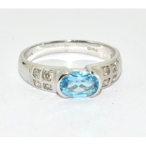 580 - A Topaz/Diamond 10ct white gold ring Size L