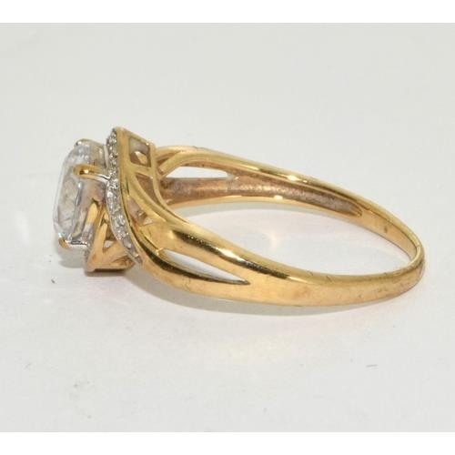 584 - 9ct Gold Twisted Shape Ring. Size L