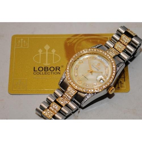 586 - Quality Lobor ladies mid size day/date automatic watch, MOP dial and jewelled bezel and bracelet. 36... 