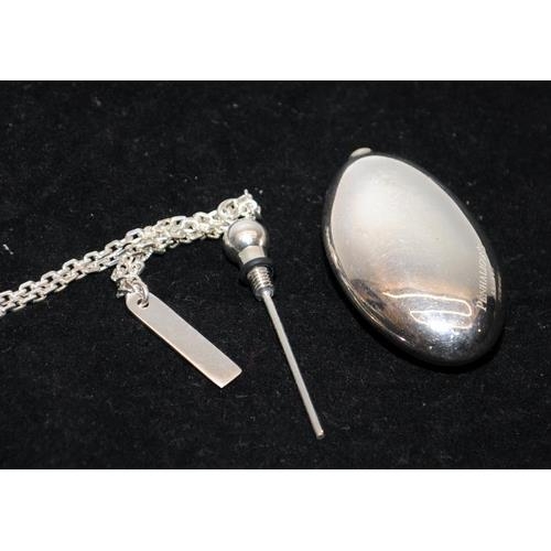 645 - Sterling silver Penhaligon's of London oval scent bottle pendant and chain. Chain length 36