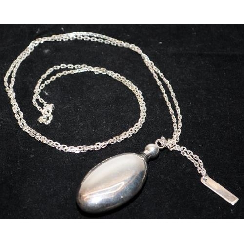 645 - Sterling silver Penhaligon's of London oval scent bottle pendant and chain. Chain length 36