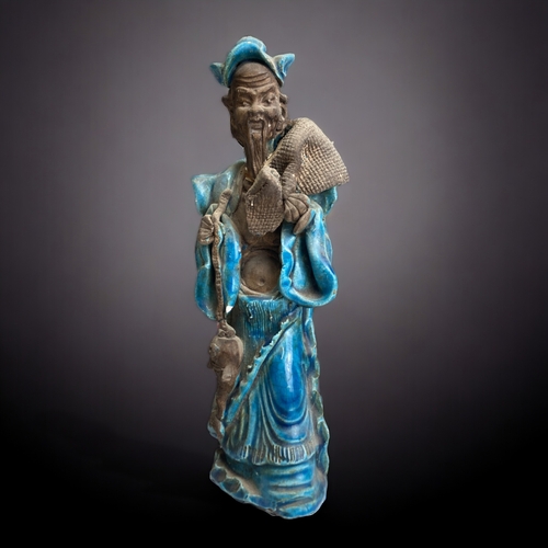 18 - Pair of 18th century Chinese stoneware figures, overlaid with a thick turquoise glaze.
Height - 25cm