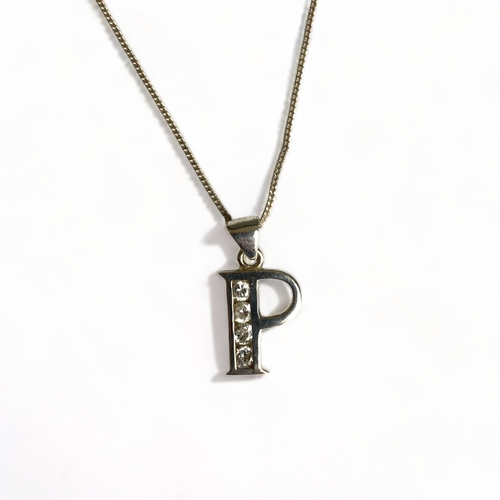 629 - Boxed silver and paste initial letter 'P' necklace.