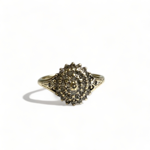 630 - A boxed 9CT Gold & Diamond cluster ring, approx. 0.25cts total.
Size K.