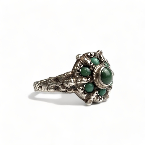 635 - An unusual silver and malachite cluster ring, possibly Chinese or Tibetan, size Q. 
Unmarked but tes... 