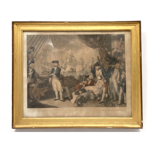 653 - A large gilt framed coloured lithograph.
'The battle of the Glorious first of June 1794'.
75 x 62 cm