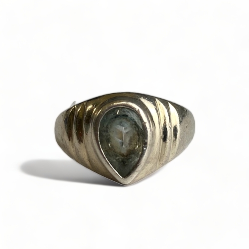 642 - A Silver (unmarked but tested) and teardrop shaped aquamarine crystal ring, size N.