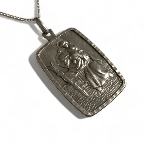 643 - A Large rectangular silver St Christopher pendant, London 1977, 4.3cm by 2.6cm, on silver chain mark... 