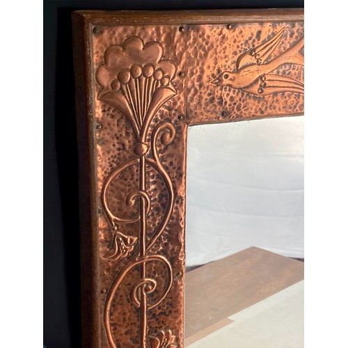 620 - An Arts & Crafts copper & oak wall mirror by John Pearson.
Circa 1890.
49 x 48 cm