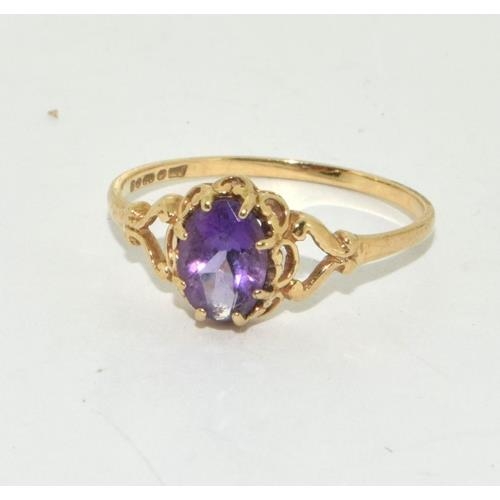 675 - A 9ct Gold & Amethyst solitaire ladies Ring. 
Size M