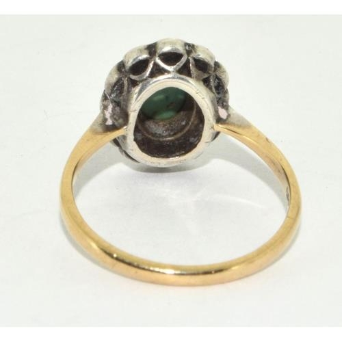 676 - A 9ct Gold & Silver Jade  Ring. size M