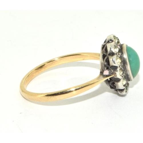 676 - A 9ct Gold & Silver Jade  Ring. size M