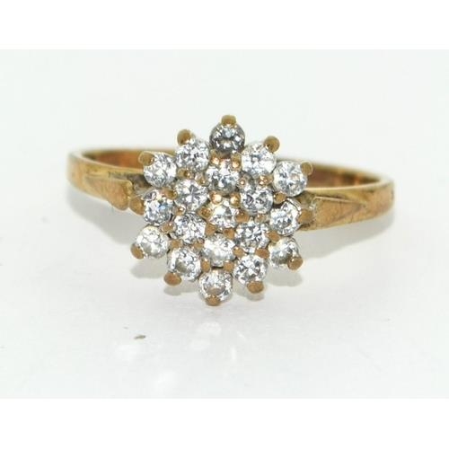 678 - 9ct gold ladies flower head design cluster  ring size P