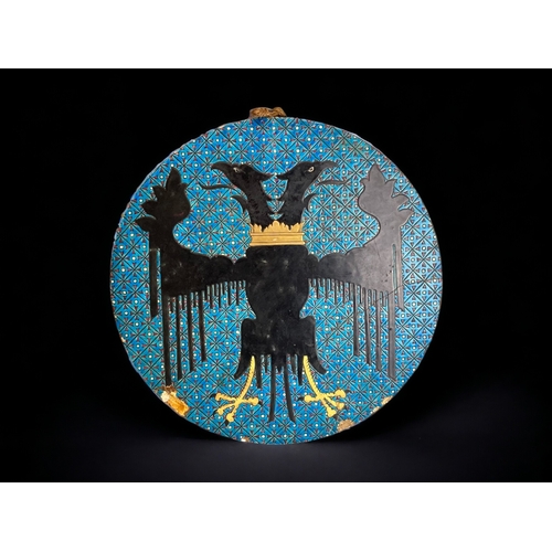 656 - A large, heavy 19th Century Majolica round wall tile. Depicting double headed eagle.
Diameter - 40cm