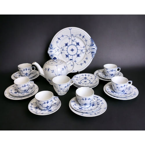 658 - A Royal Copenhagen 'Blue fluted half lace' pattern part tea set. Including Tea pot, 6 teacups, break... 