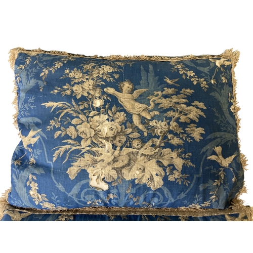 688 - A PAIR OF 19TH CENTURY FRENCH BLOCK PRINTED CUSHIONS.