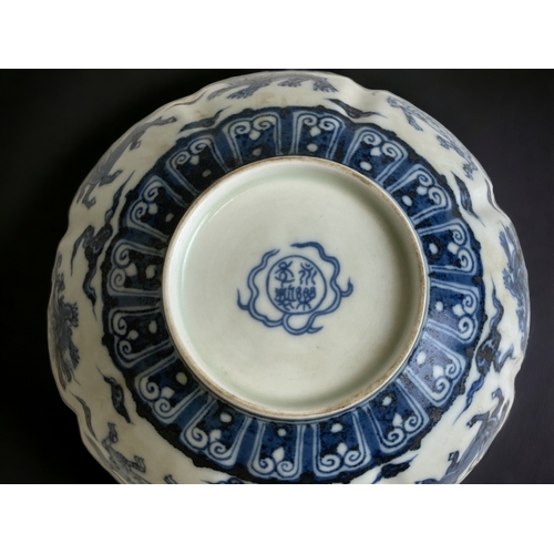 71 - A Chinese republic 'Eggshell' porcelain octagonal bowl. Decorated in blue & white 'Ming' style. Mark... 