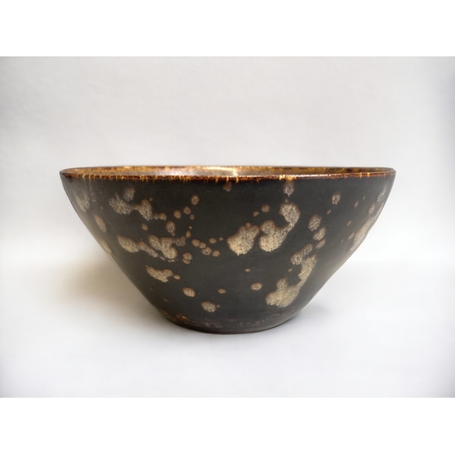 66 - A Chinese Jizhou type 'papercut' bowl.
6.5 x 13.5 cm