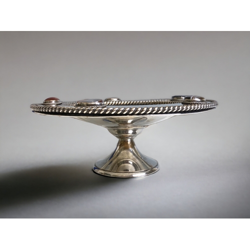 767 - A large Scottish Arts & Crafts silver plated pedestal bowl. 
With rope twist rim & bonded agate cabo... 