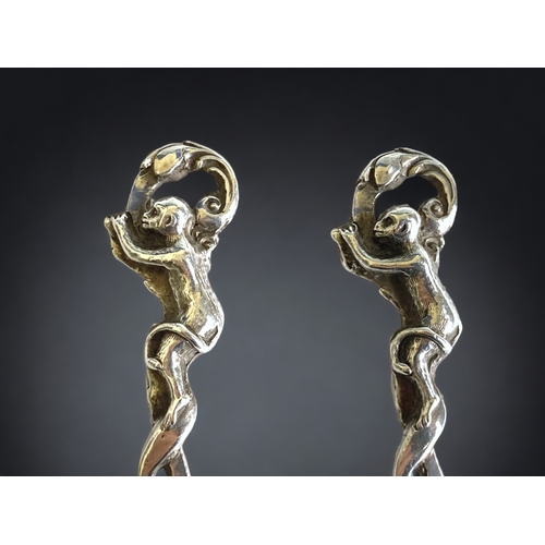 757 - A rare pair of Victorian Silver 'Monkey' spoons. 
By Mackay, Chisolm &co, Edinburgh.
Each depicting ... 