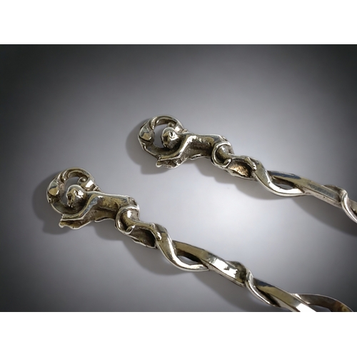 757 - A rare pair of Victorian Silver 'Monkey' spoons. 
By Mackay, Chisolm &co, Edinburgh.
Each depicting ... 