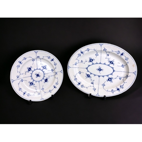 660A - A collection of Royal Copenhagen 'Blue fluted half lace' pattern dinner wares. Including plates, bow... 