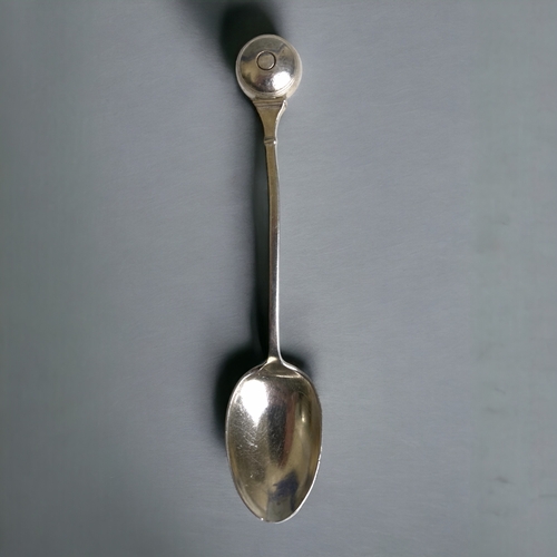 764 - An 1859 silver 'ball handle' spoon by Barker brothers, together with a Dutch 800 silver souvenir spo... 