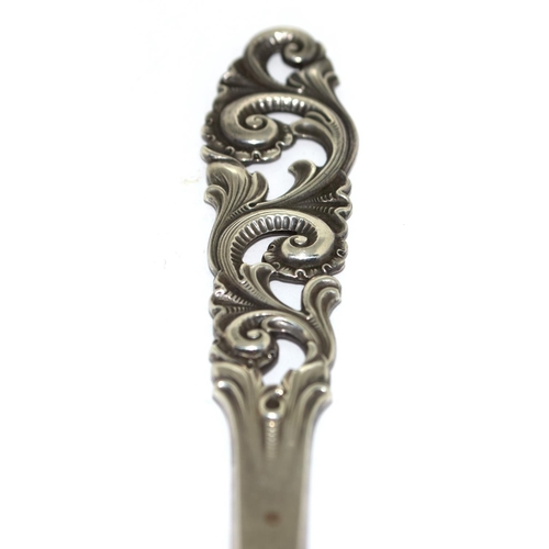 742 - Silver embossed handle serving spoon 24cm long 76g