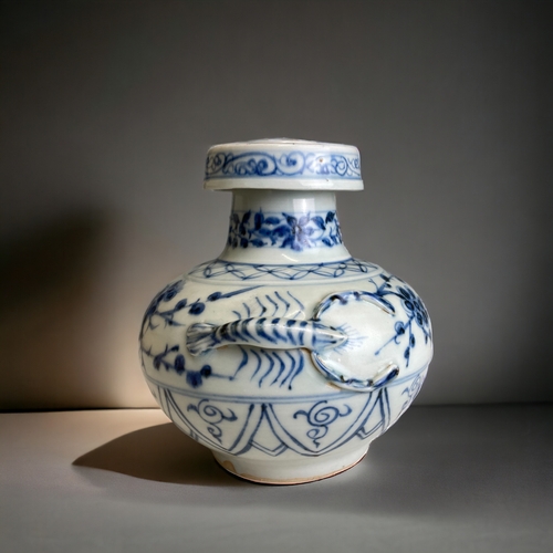 81 - A CHINESE PORCELAIN EWER.
Yuan dynasty. Stylised with twin spout & a lobster handle in high relief.
... 