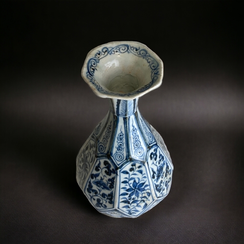 82 - A Yuan dynasty blue & white vase.
Pear shape, faceted octagonal form. Rising from a conforming foot ... 