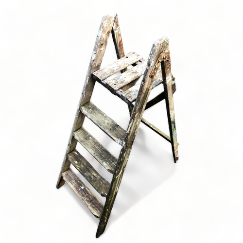 134 - A vintage wooden step ladder.