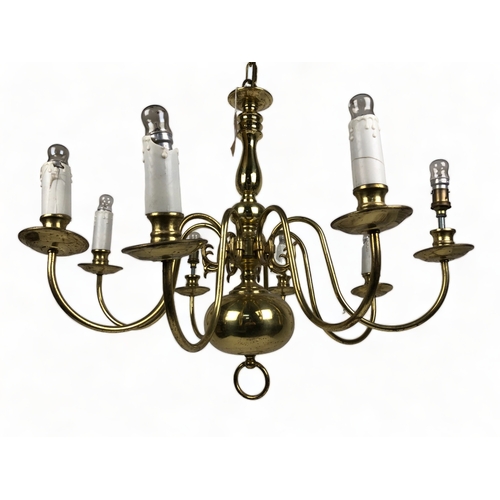 183 - A vintage 8-branch brass chandelier.