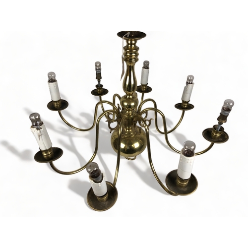 183 - A vintage 8-branch brass chandelier.