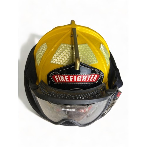 185 - A NEW CAIRNES 1010 AMERICAN FIREFIGHTERS HELMET, FOR ANDOVER FIRESTATION